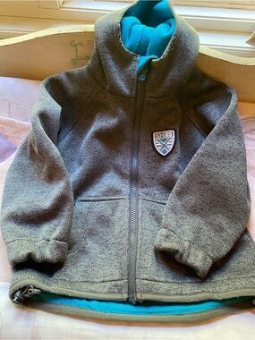 Kids Grey Fleece Jacket with Teal Lining - SM89 Badge